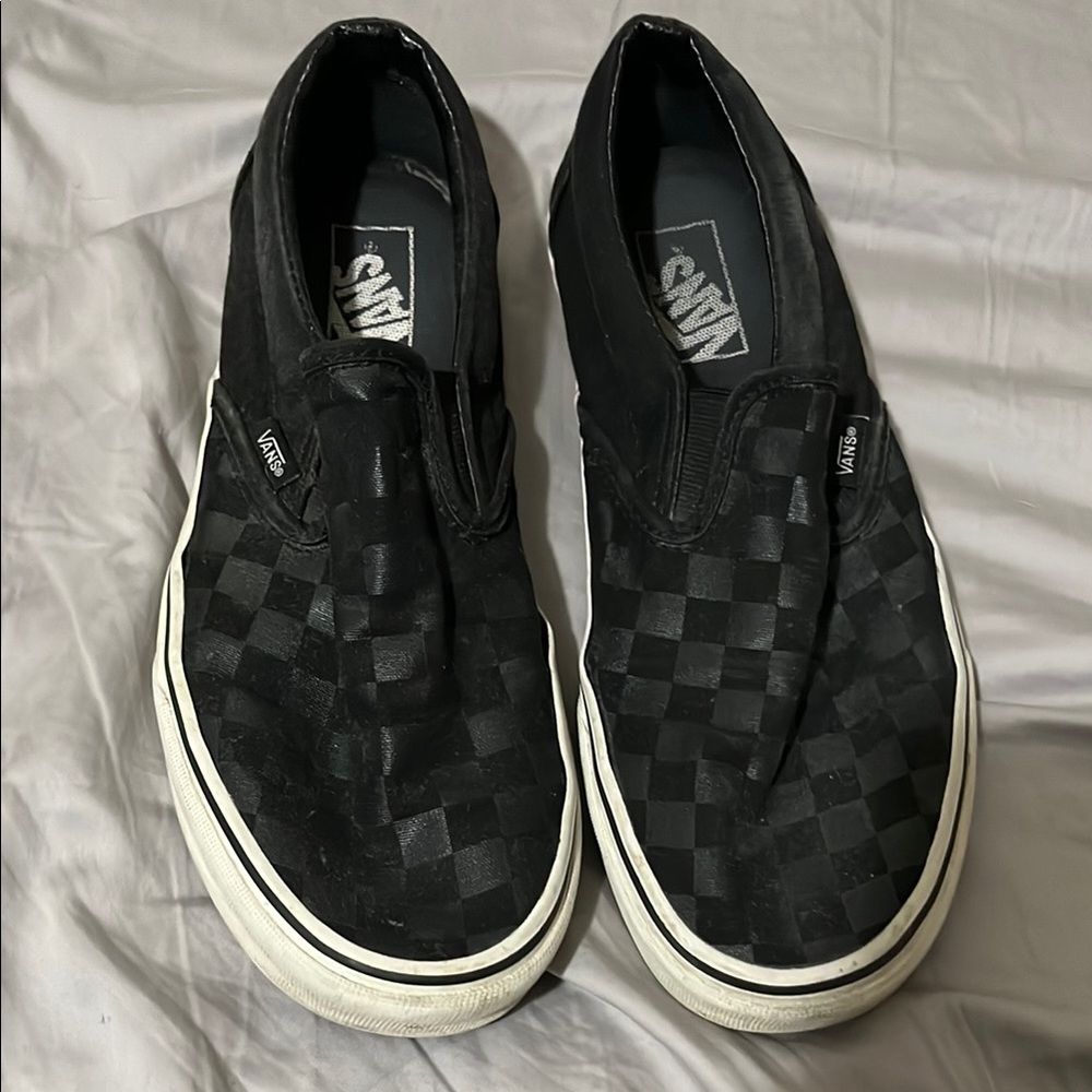 Vans Black Slip-On Sneakers with Checkerboard Design